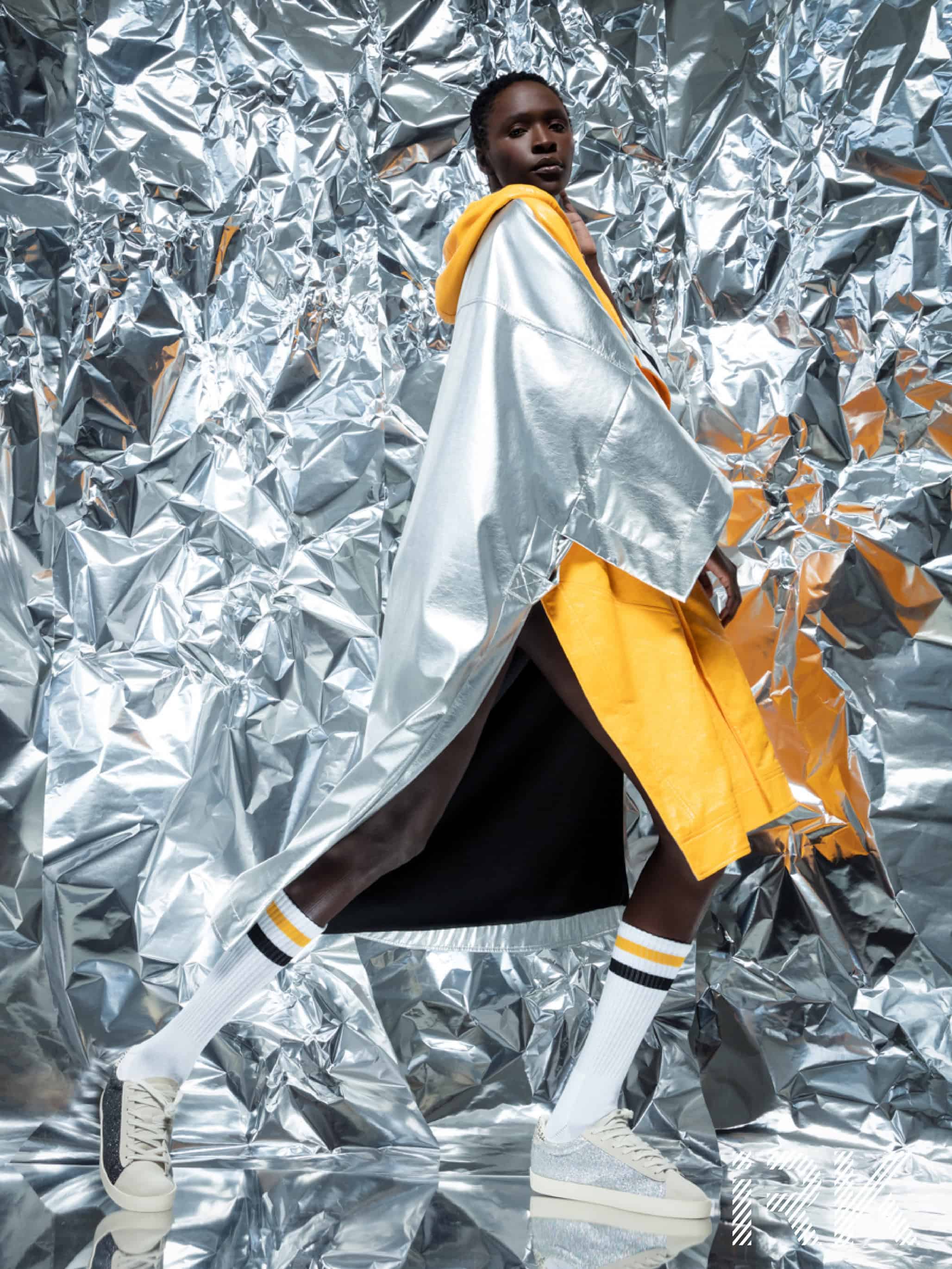 Silver sportswear 
Cape by A.POTTS, socks by M.MONFOOT, shoes by GOLA