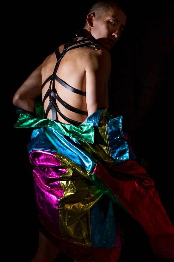 Underground model wears Foil long trucker jacket by Brian Swift, Leather cage shirt by Roberto Calasanz