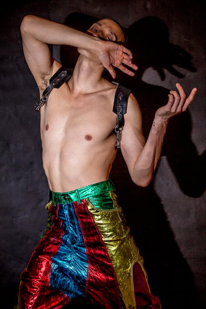 Underground - Model wears Foiled drop crotch trousers by Brian Swift, made to order shoulder harness by Roberto Calasanz