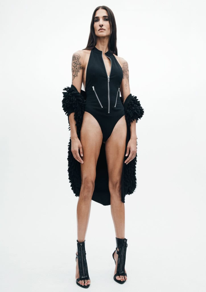 Sweater vest: Stella Mccartney Bodysuit: I.AM.GIA Show: Givenchy Septum ring: Auri