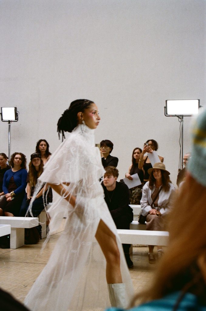 Two models wear Hannah Smith’s inclusive collection during the Central Saint Martins runway show, blending structure and softness.