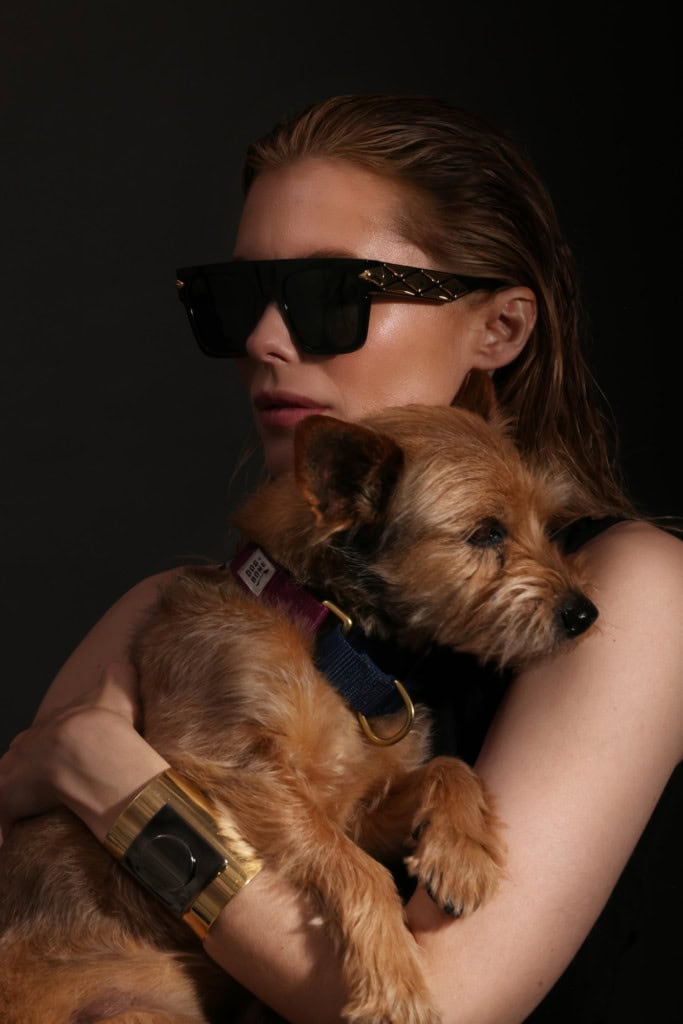 Susie Abromeit wears Sunglasses: Louis Vuitton @louisvuitton Cuff: PLUMA @pluma_italia Dog: Charlie
