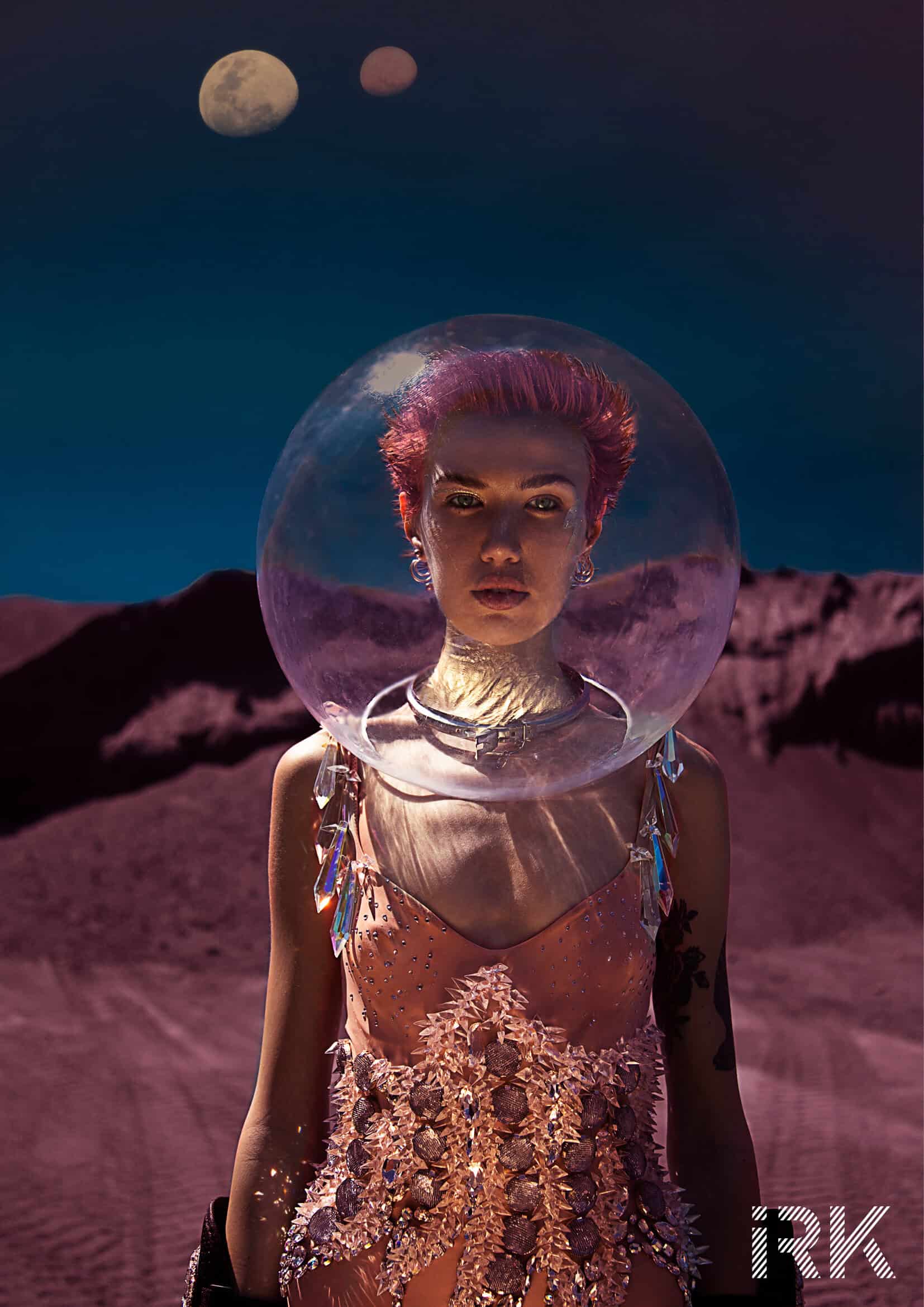 Space age globe on head. Sureal images. Bodysuit & Gloves On Aura Tout Vu.