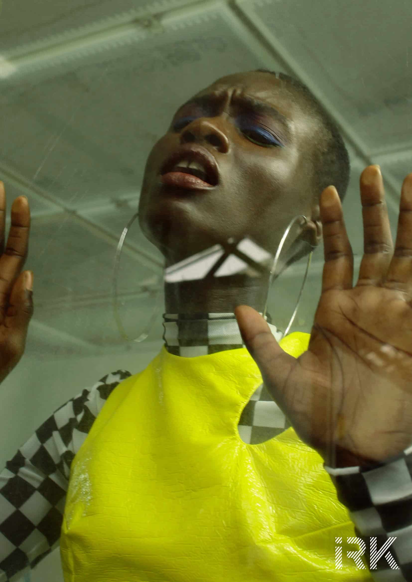 Thieves in the Garage Editorial: Top Raphaël Delacroix, Turtleneck Left Fig, Earring Zara.