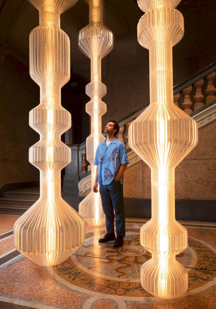 Light installation art with illuminated sculptural columns at IRK Magazine event.