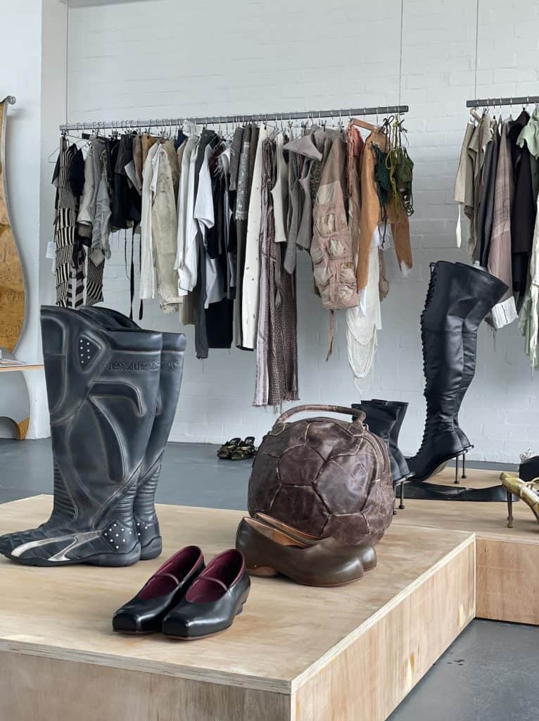 Fashion rack and design objects in London, showcasing curated pieces by emerging and radical designers.