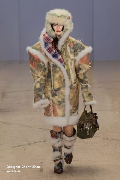 Model wears a translucent shearling-lined coat with layered prints, tartan details, and matching fur boots—designed by Chanri Zhao at Central Saint Martins.