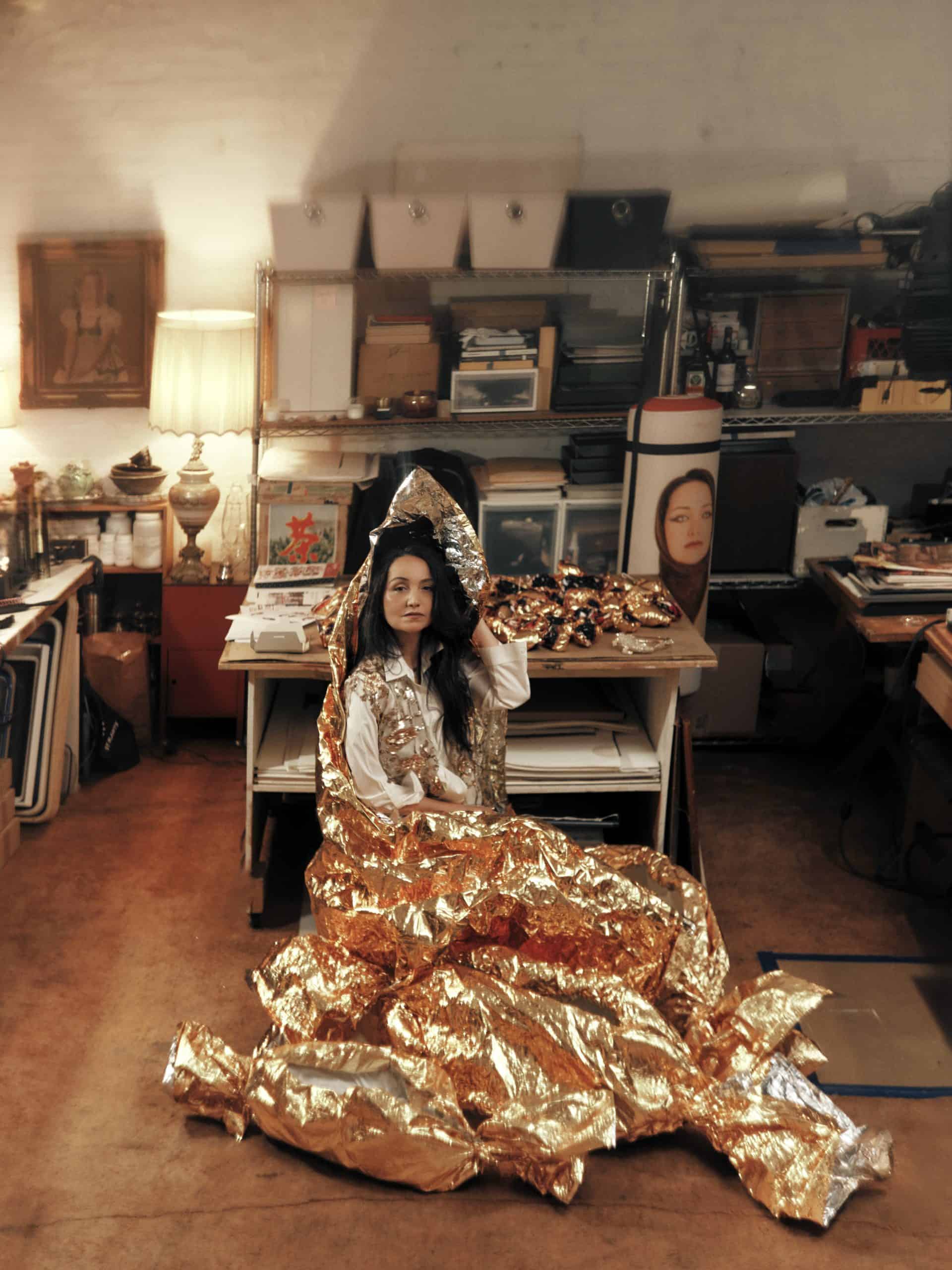 Faten Gaddes gold dress look