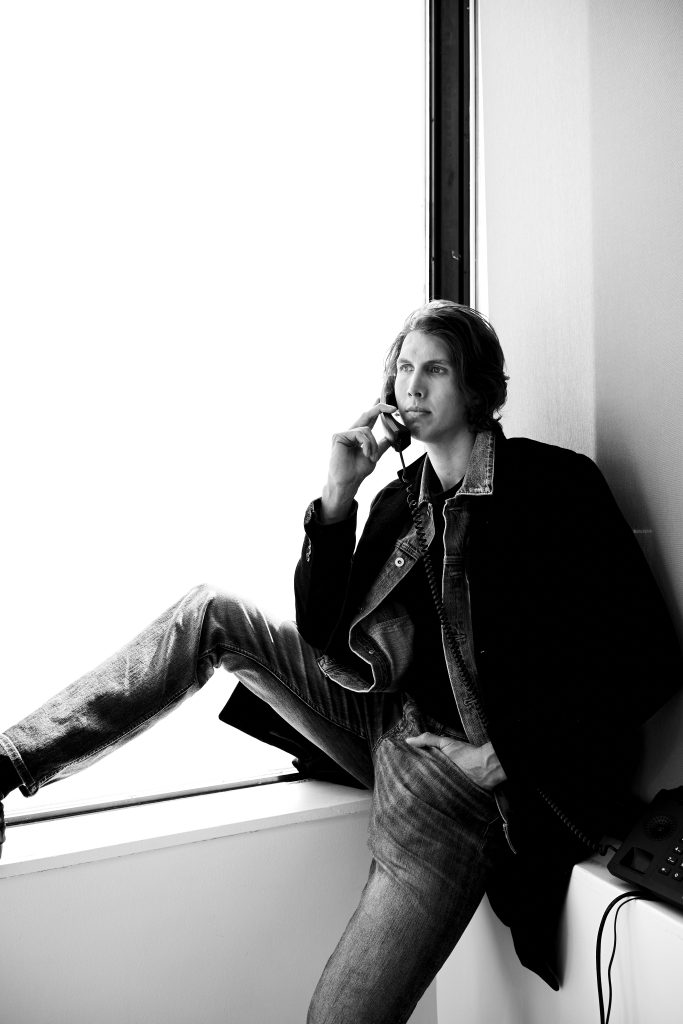 styled by Clay Dealy and photographed by Van Strahl. A noir-inspired portrait with creative direction by Cannon.