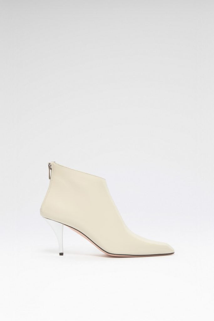 Minimalist cream leather bootie with stiletto heel by Jean-Michel Cazabat