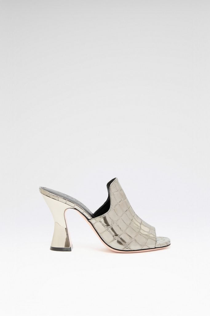  Open-back mule in cream embossed leather with flared heel.