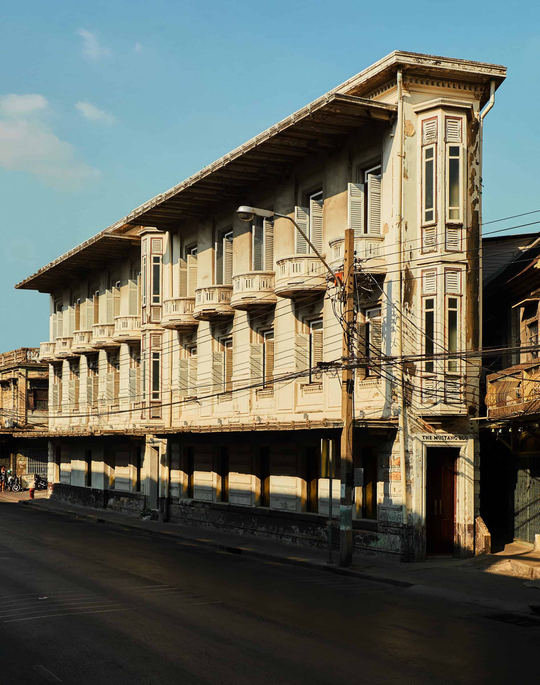 warm natural light color photo hotel facade architecture