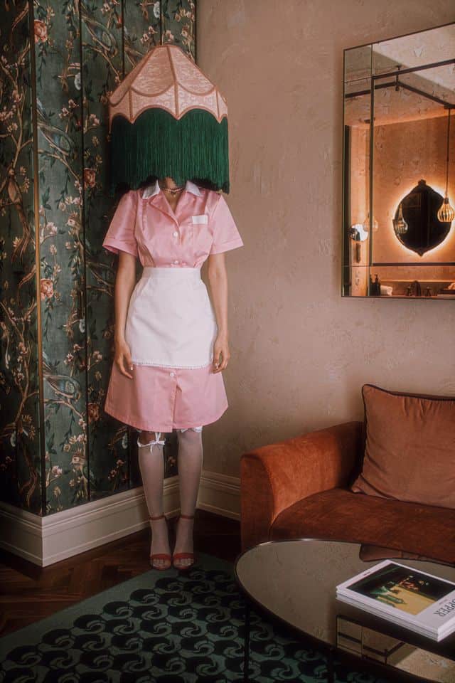 Maid Hiding Lipstick on Mirror Hotel Motto (c) Stefan Kokovic