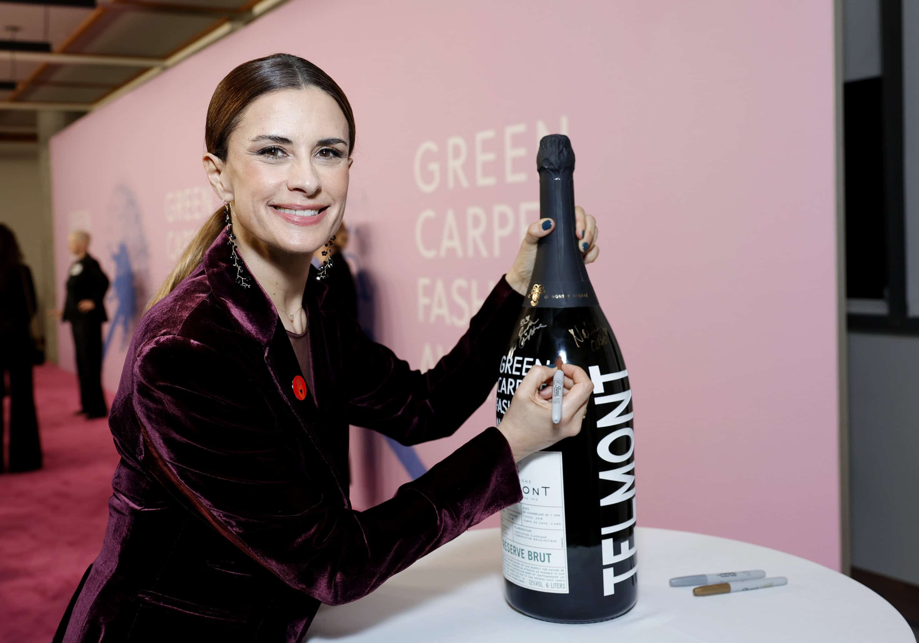 Livia Firth on red carpet at Green Carper Fashion Awards, fashion photography