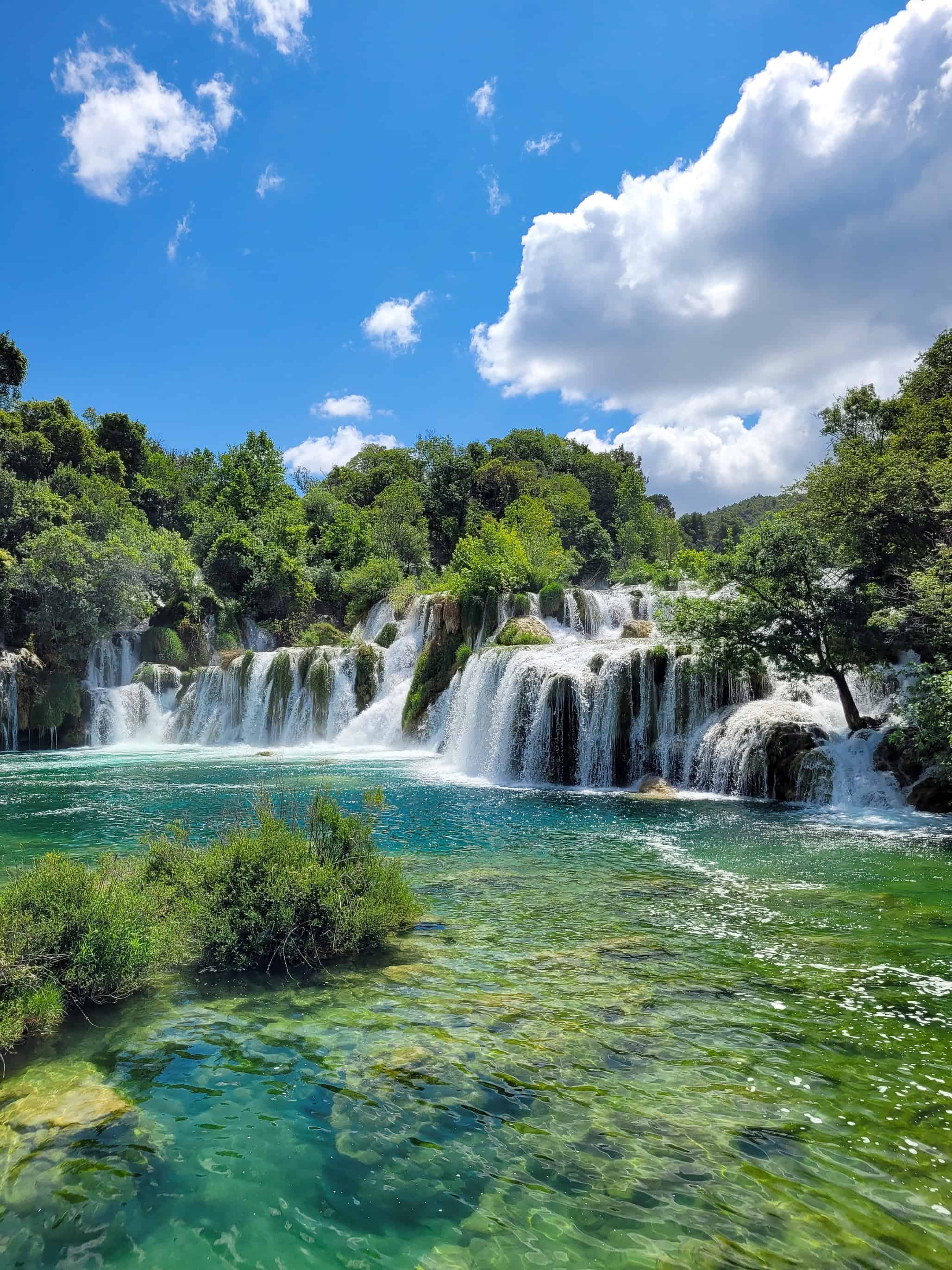 color landscape photograph of waterfall