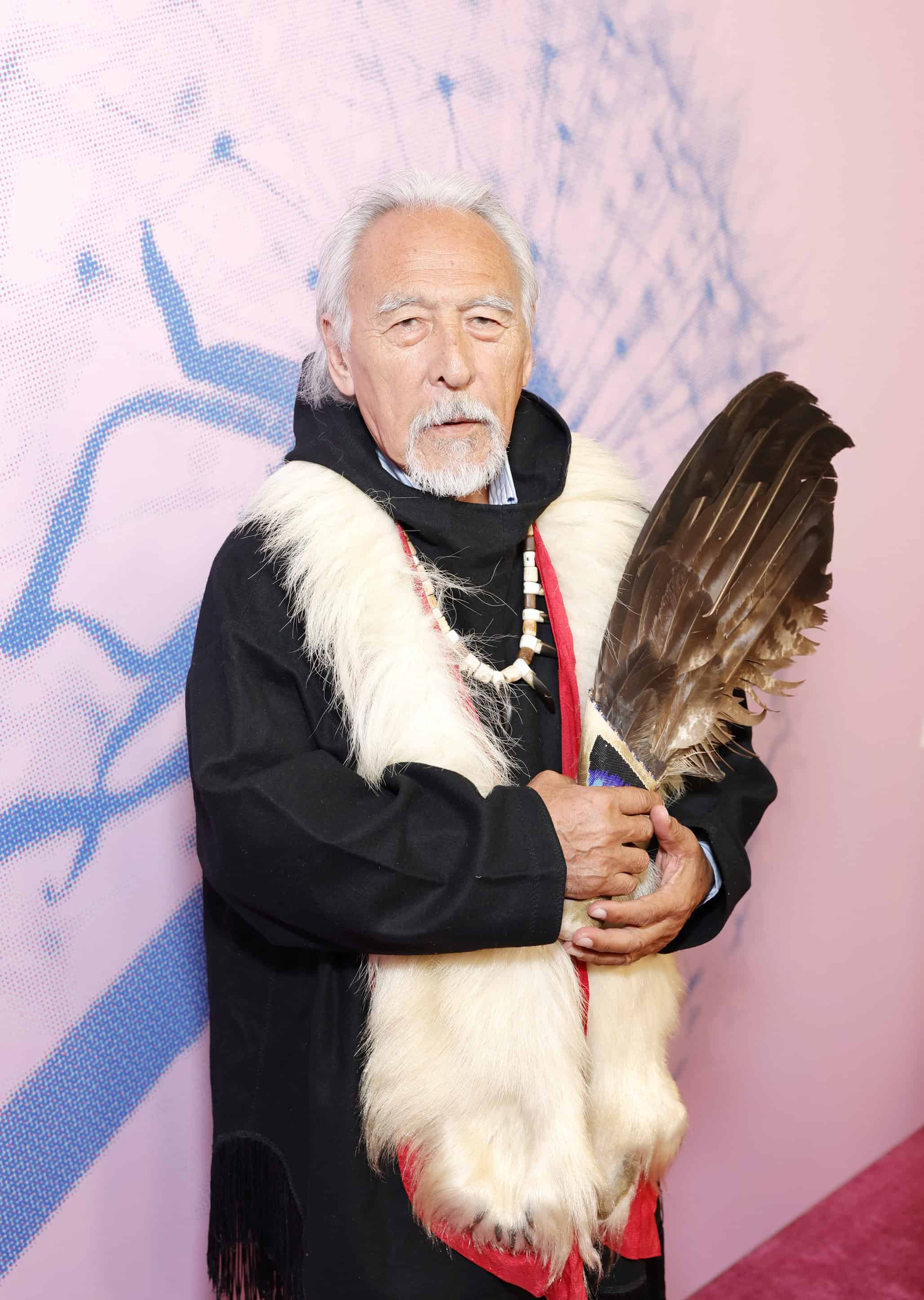 Angaangaq Angakkorsuaq on red carpet at Green Carpet Fashion Awards, fashion photography