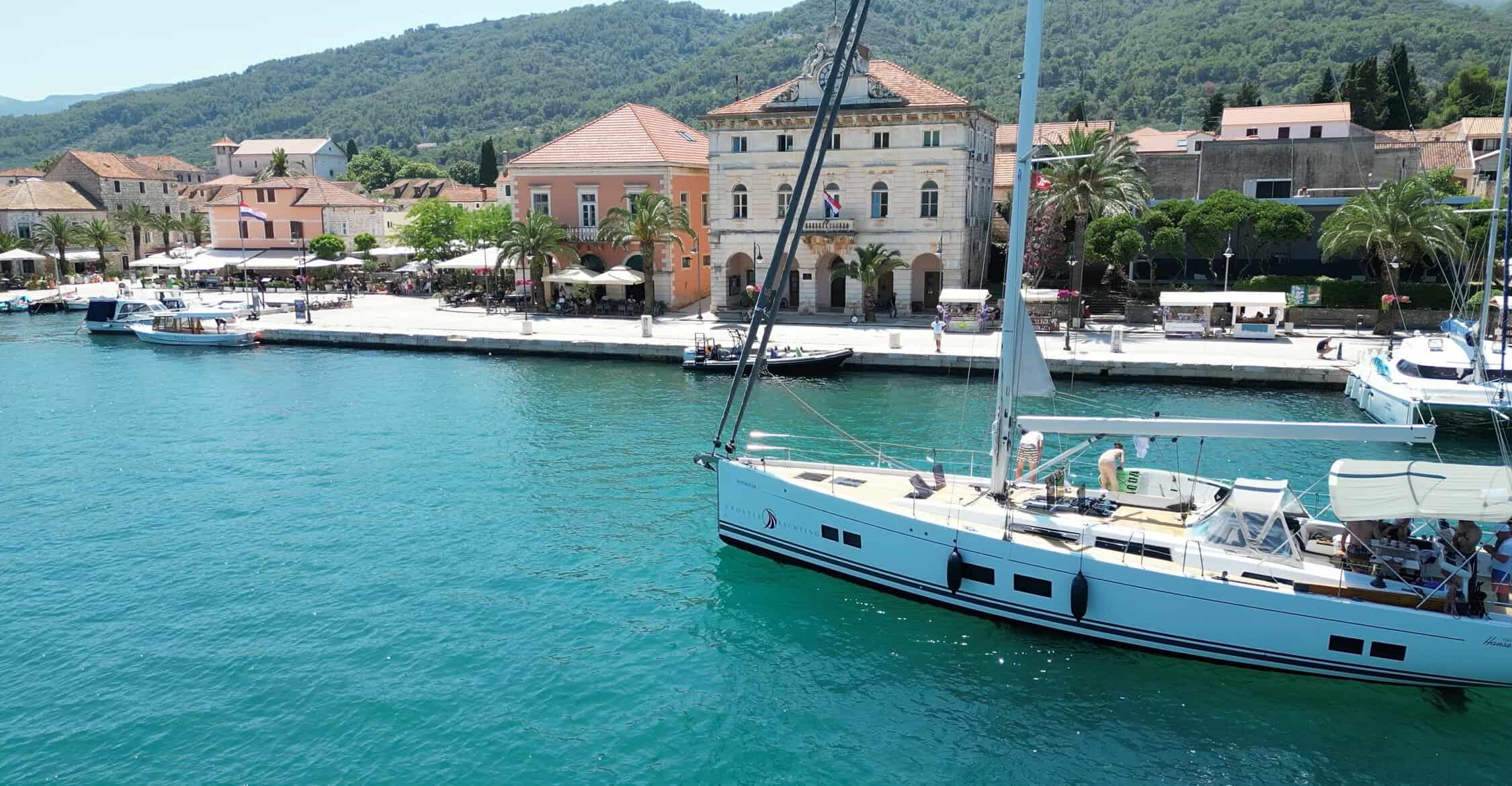 color landscape photograph of boat in marina
