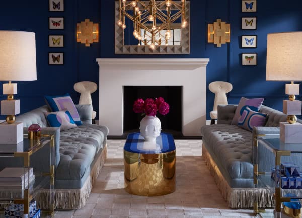 Photo of living room with blue wall courtesy of Jonathan Adler