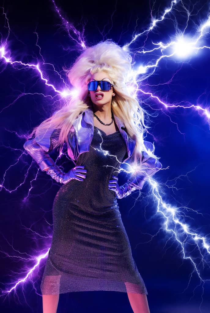 Dress: Saima Chaudhry fromConfessional Showroom NYC, Jacket: Vinca Schiffmann from Confessional Showroom NYC, Glasses: HauteLife World Eyewear from Flying SoloLouis, Necklace: Louis Vuitton, Gloves: Vintage
