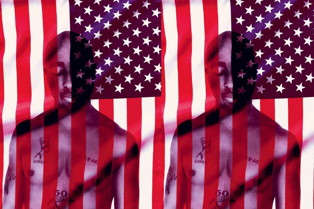Tupac behind the US flag