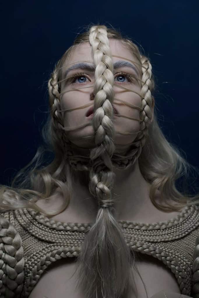 incredible hair style with braided mask in this viking inspired shoot